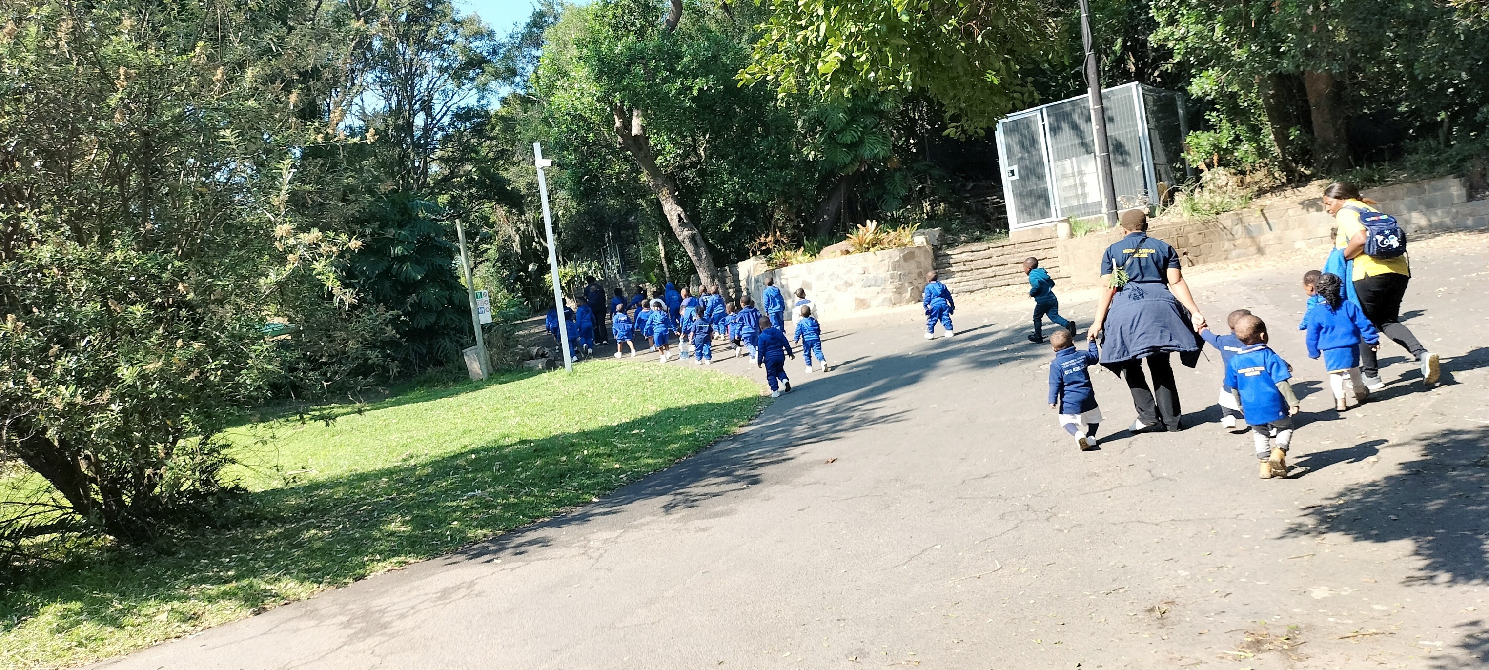 Children on pathway with instructor
